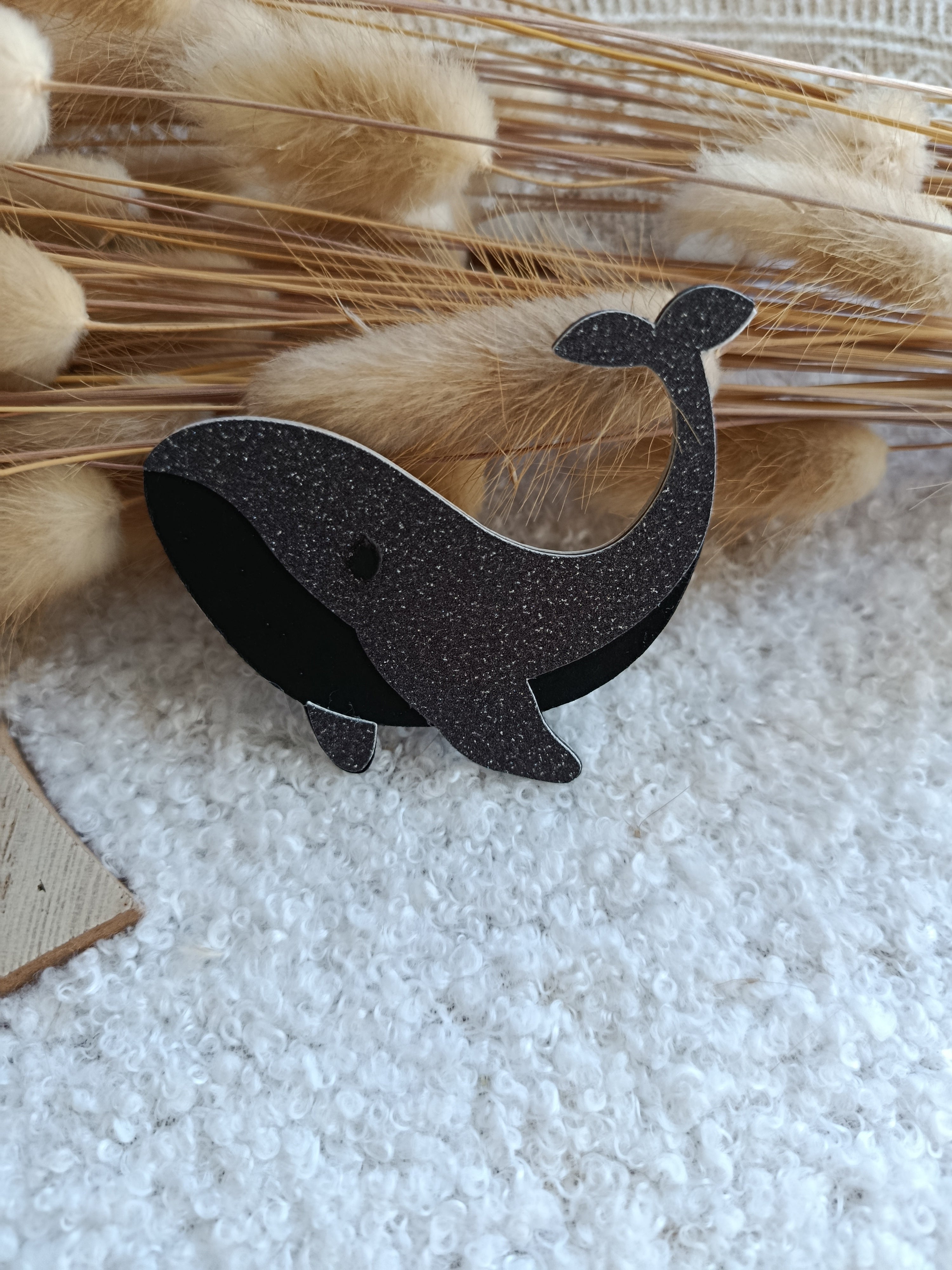 Broche baleine